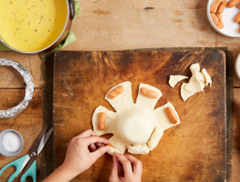 mini hot-dogs around the dough